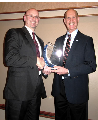 Kenny Dillard, Dr. John Howard presenting SIS award